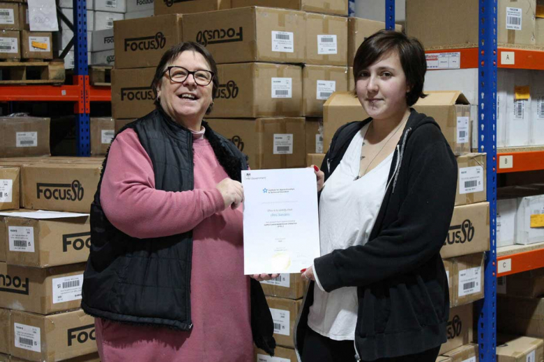 Assembly Manager Val Chandler (left) presents Anni with her certificate