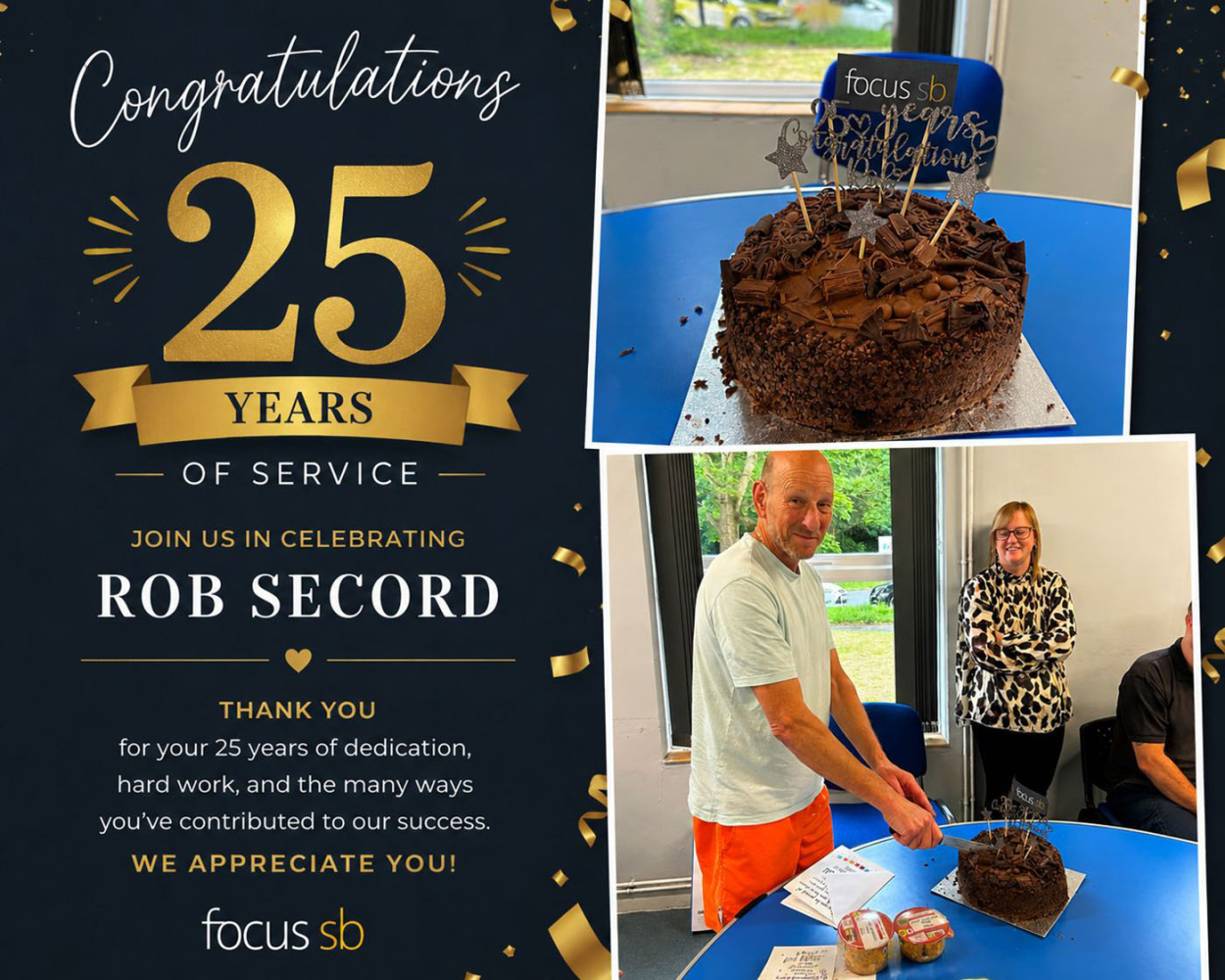 Rob celebrates 25 years service with other staff members