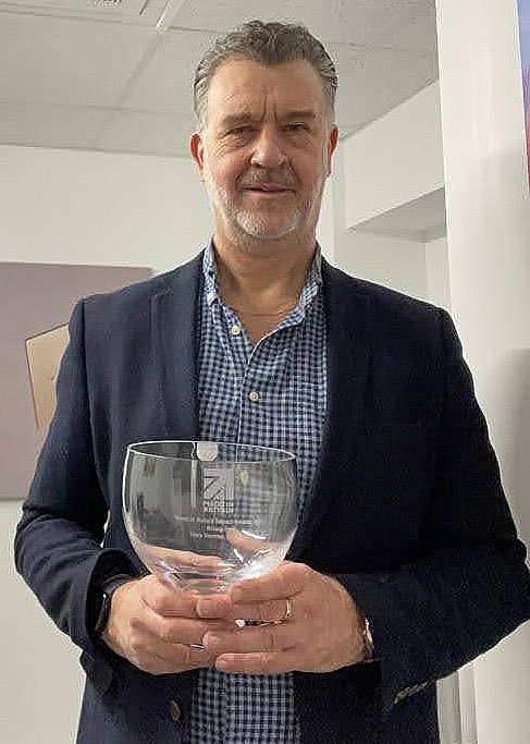 Gary Stevens with his award