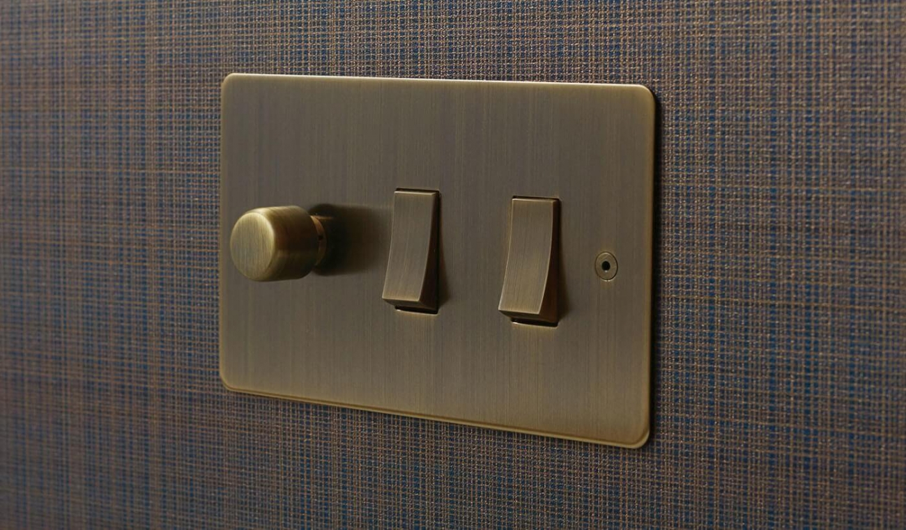Horizon Classic combination lighting control switch, Antique Brass.