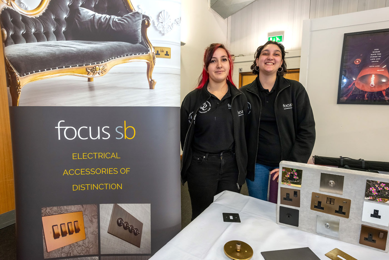 Supply chain warehouse operative Anni Sanders with health &amp; safety technician Molly Parmar