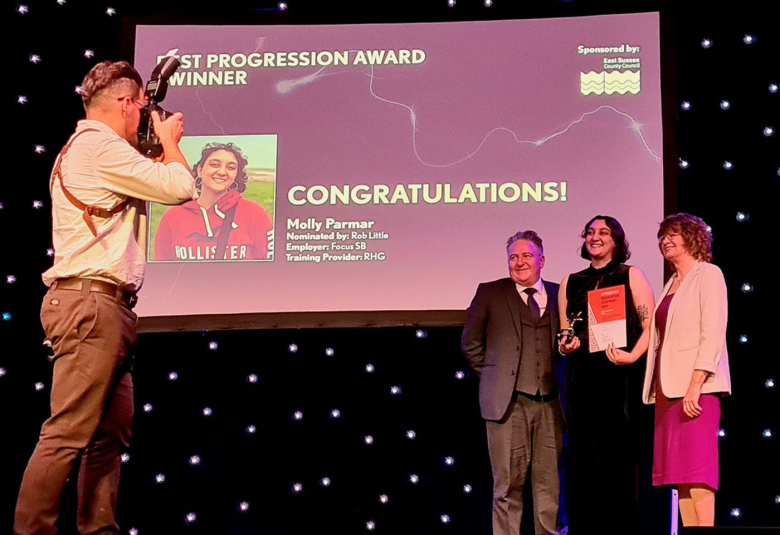 Molly Parmer collects her certificate for SHE Technician Level 3 (Safety, Health &amp; Environment) at East Sussex Apprenticeship Graduation 2024 and also won the Best Progression Award.