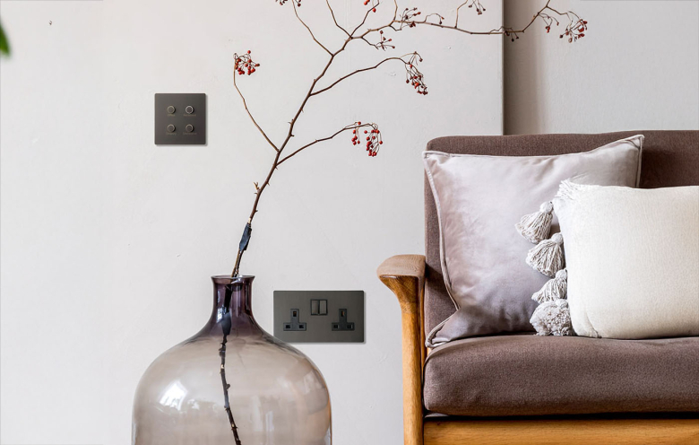 'Lutron Signature Metals by Focus SB&rsquo; in Aged Bronze finish.