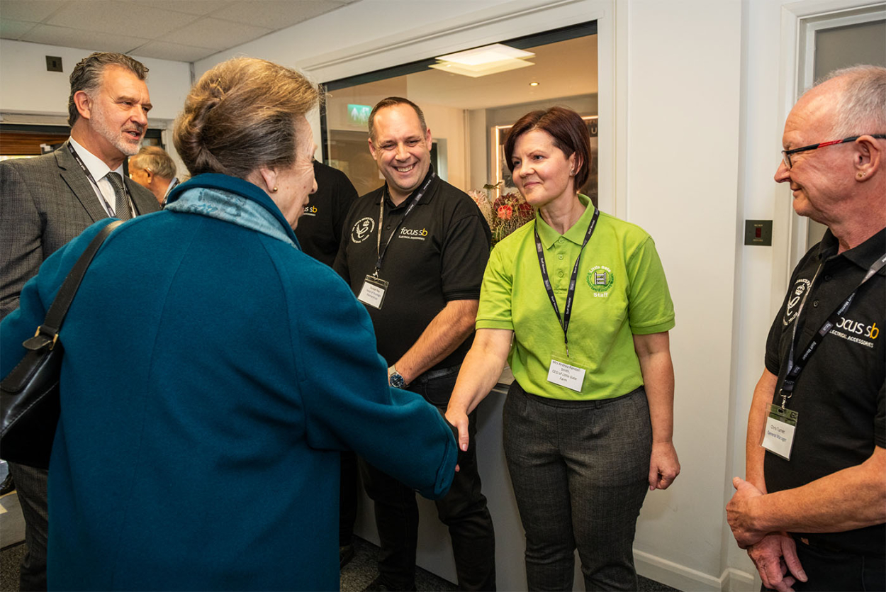 Duncan pictured middle after meeting HRH The Princess Royal last November 